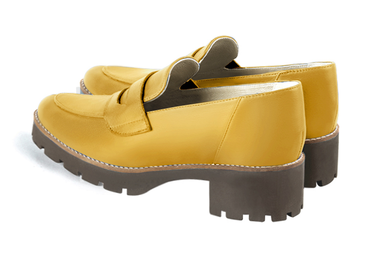 Mustard yellow women's casual loafers. Round toe. Low rubber soles. Rear view - Florence KOOIJMAN